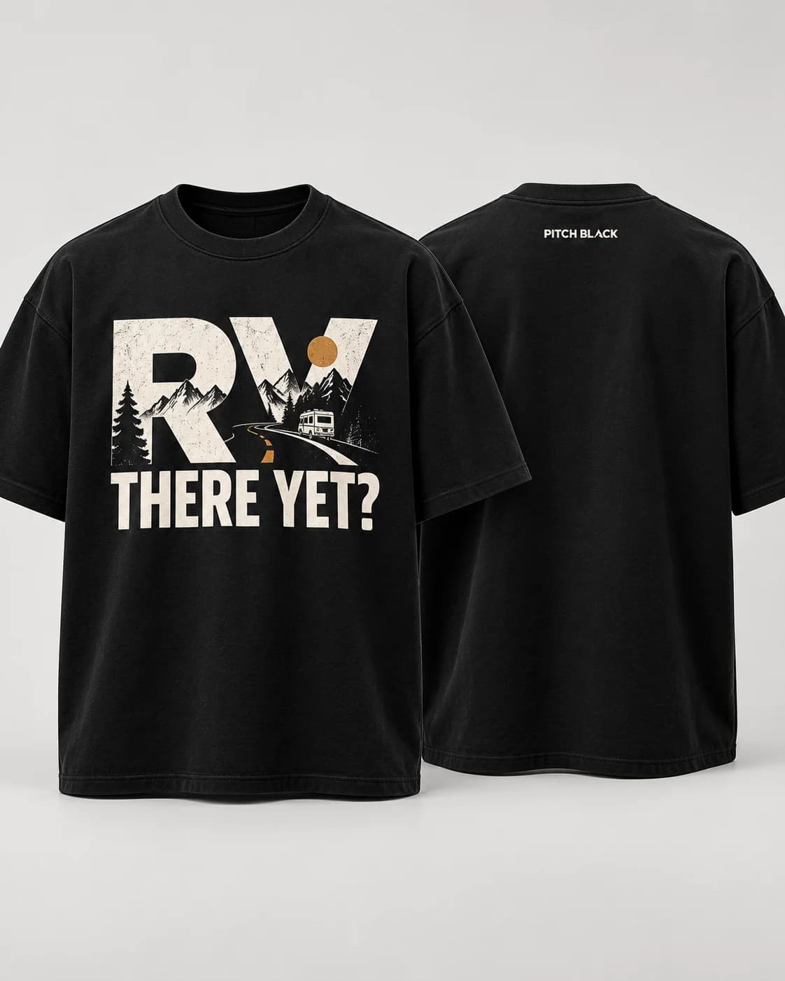 Front and back views of the black RV There Yet tee with a distressed mountain road and RV graphic